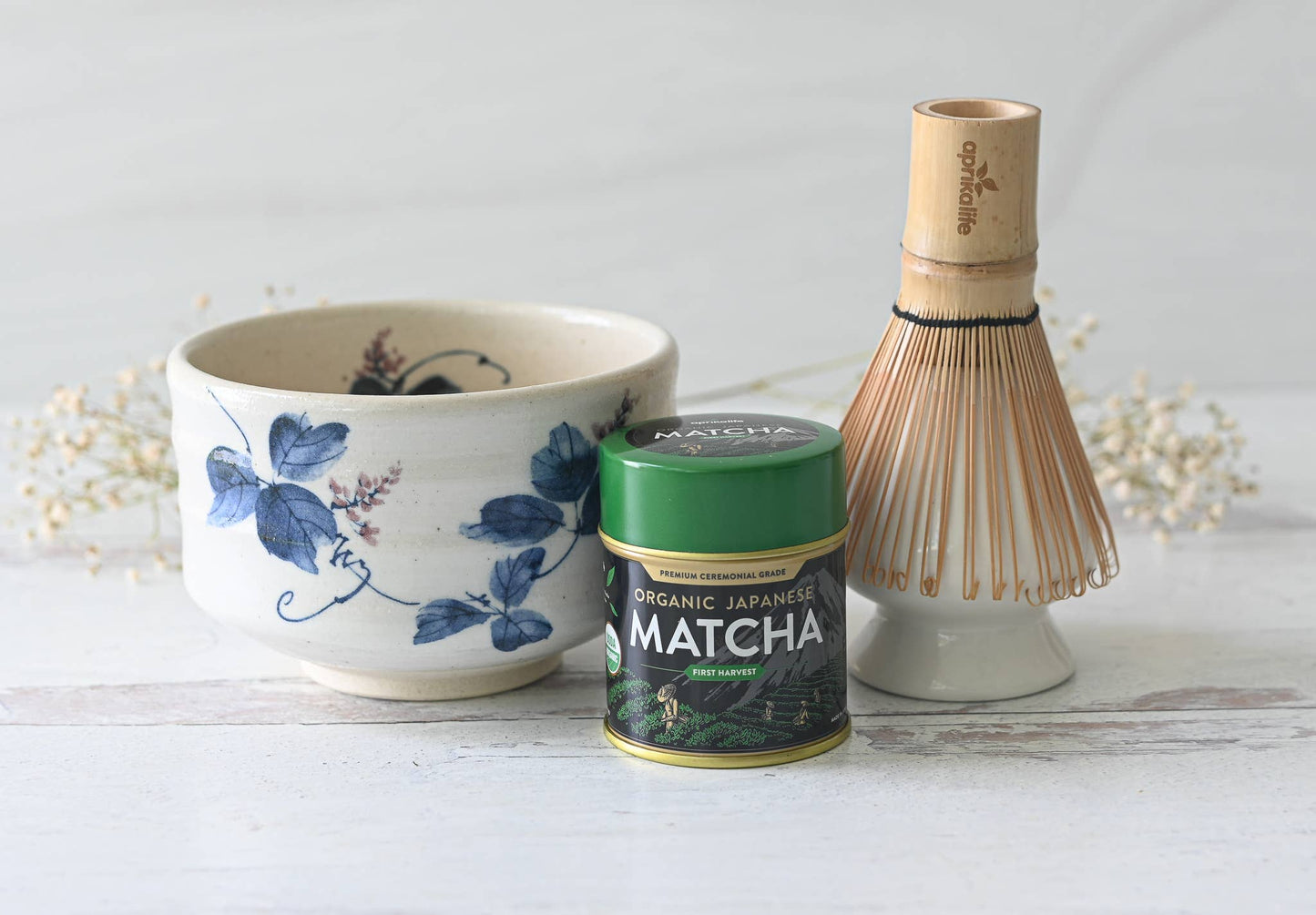 16 oz. Japanese handcrafted matcha bowl with blue flowers, organic ceremonial grade Japanese matcha in tin, whisk chasen with whisk holder