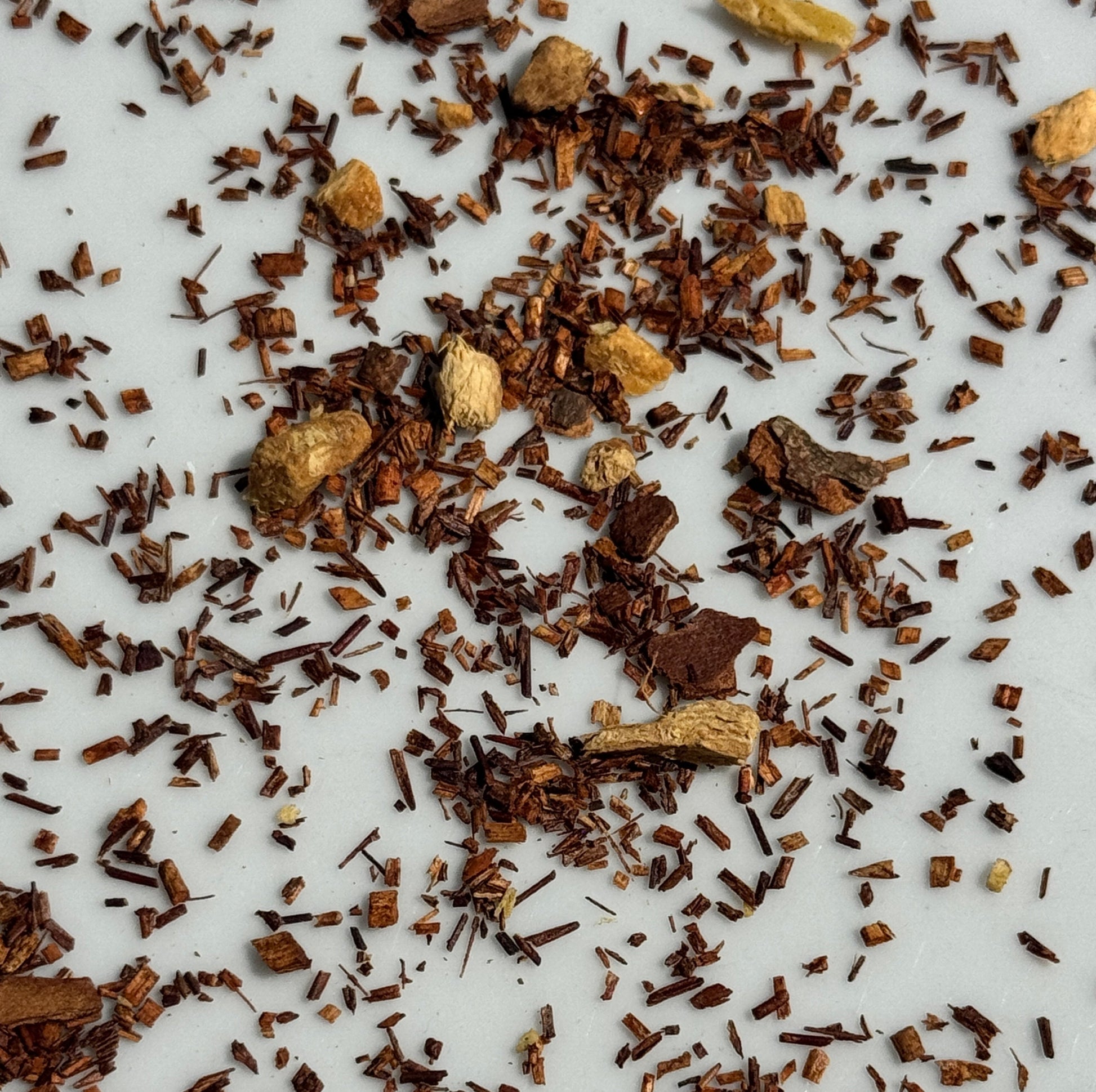 Rooibos Chai tea with Ginger on white background
