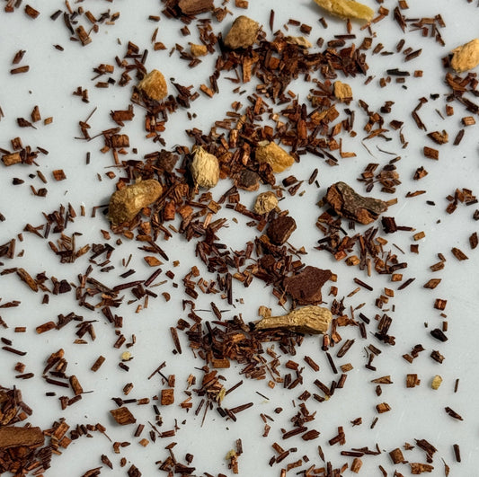 Rooibos Chai tea with Ginger on white background
