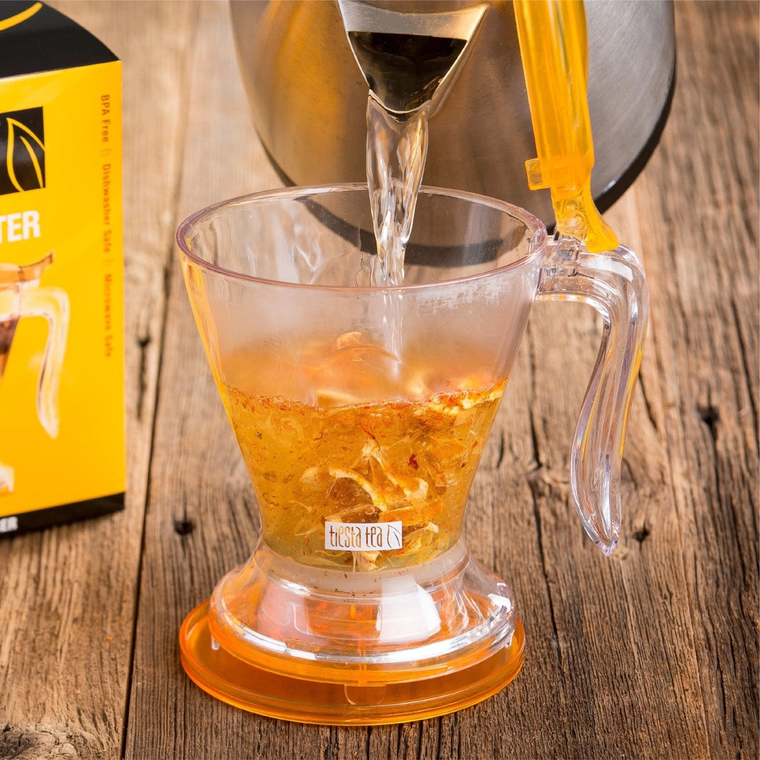 pouring water into Tiesta Brew Master - Tea & Coffee Maker - Gold